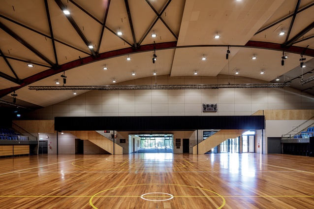 Linked to the pavilion is the Alex Bowman-designed basketball stadium, with its glulam arches, now seismically strengthened, and with new staircases.