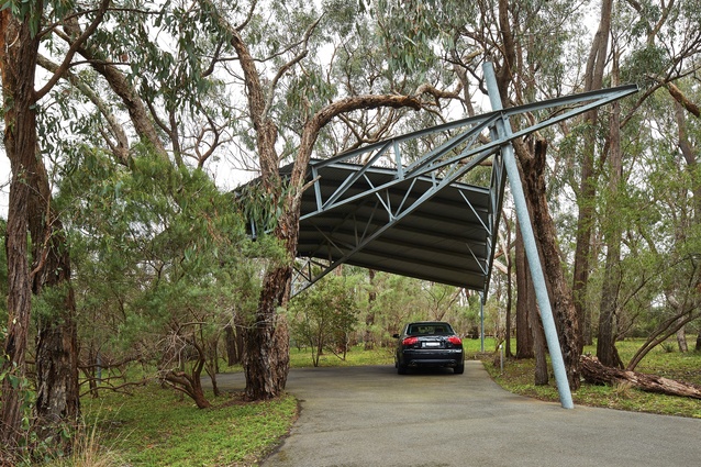 The standalone carport was designed in 1988 by Wood Marsh in a similar language to that of the house itself.
