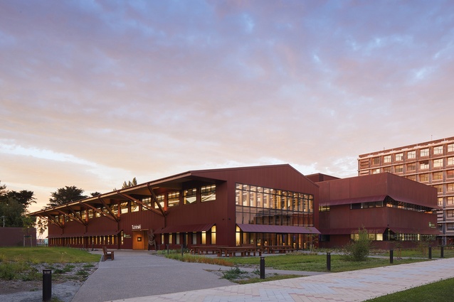 The two-storey building is split into two parallel wings, one housing the offices and the other the laboratories.