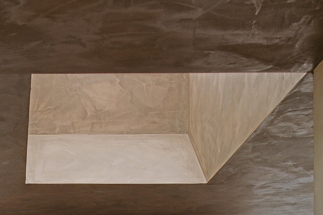 Where the ceilings are lowered and light reflects the basalt’s rich textures.