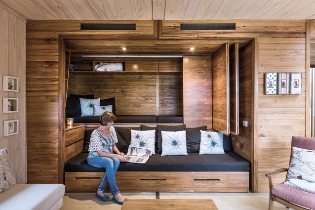First Light House: The living area features a custom-designed built-in furniture unit which functions as a seating area during general use but transforms to sleep up to four people.