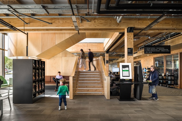 Stairs lead from the main library facilities to additional collection spaces and the learning lab.