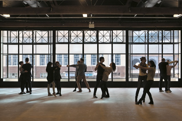 The first-floor performance space, the Loft, looks through the original windows out onto Queen Street.