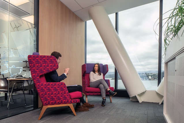 The purple and pink chairs are Aspect October Wing chairs. Office chairs and workstations are also from Aspect.
