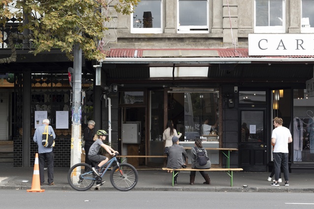 From the cover of the May/June 2020 issue of <em>Architecture NZ</em>: Baristas power up Orphans Kitchen on Auckland's Ponsonby Road as New Zealand moves down to Alert Level 3 during the COVID-19 pandemic.