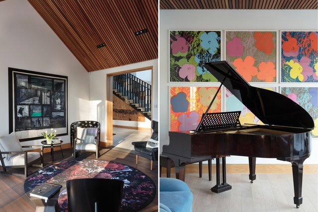 The living room features a Marcel Wanders Moooi rug and a Philippe Starck chair, as well as a collection of artworks by New Zealand artists; on the other side of the gallery, a formal sitting room is furnished with a grand piano and a wall of Andy Warhol <em>Flowers</em> prints.
