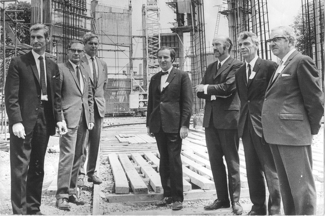 The architects and competition jury on the site of the proposed Town Hall, from left: Maurice Mahoney, P G Scoular (city engineer), George Fenton (city architect), Miles Warren, Edward (Ted) McCoy, Aubrey de Lisle and Ronald Muston. Councillors George Griffiths and Hamish Hay were also assessors.