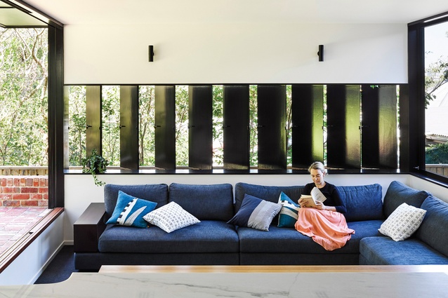 Paddington Residence, Brisbane, Australia, by Kieron Gait Architects. 2017. Solid black vertical shutter windows act like gills to draw light and the breeze through.