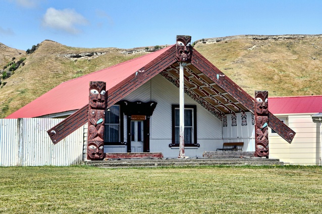 Whitikaupeka Wharenui, New Zealand. The <em>wharenui</em>, the Māori meeting house, is considered sacred, and is generally carved inside and out with stylised images of the iwi's ancestors. They always have a specific name, often of an ancestor.