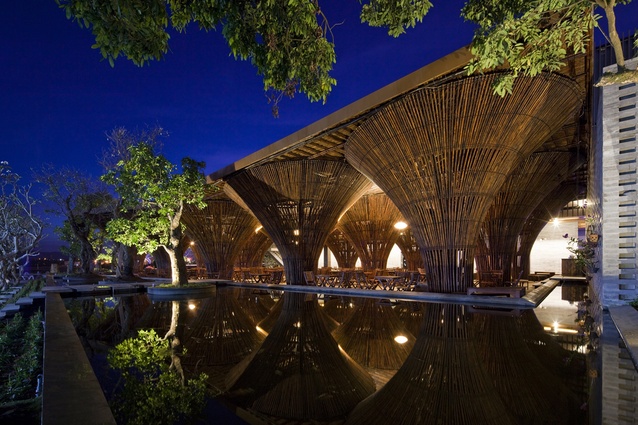 Kontum Indochine café, Vietnam by Vo Trong Nghia. Surrounded by a shallow artificial lake, the bamboo roof provides shade and maximises cool air flow in the tropical climate.