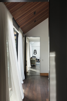 The floors are Acacia by Mafi and reflect the warmth of the sloping roofline. 
