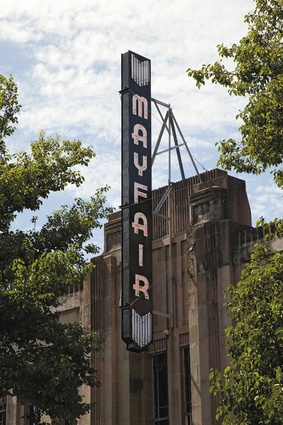 Exterior of the Mayfair theatre with art deco signage.