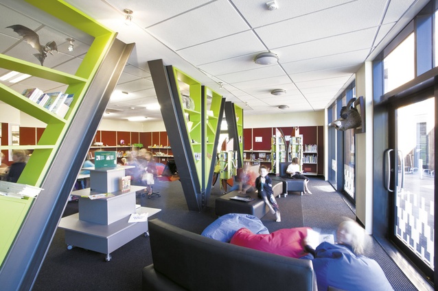 A bright colour palette enriches the library at ground level in the administration building.