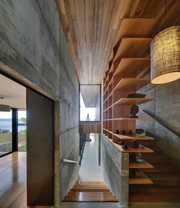 The rough off-form concrete is contrasted with fine Tasmanian oak joinery.
