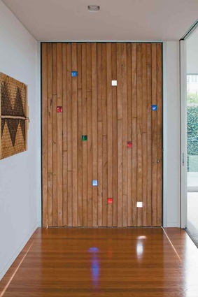 The totara front door - with glass inserts designed by Carin Wilson. 