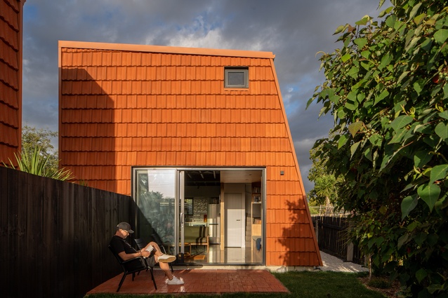 The two homes enjoy privacy while making good use of their 146m² sections, with each house occupying a floorprint of just 36m².