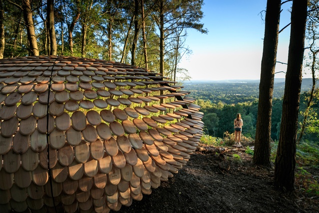 Perspectives by designer Giles Miller, Surrey, England. This shingle-covered structure is inscribed with various personal messages and is sited at the top of a natural vista.