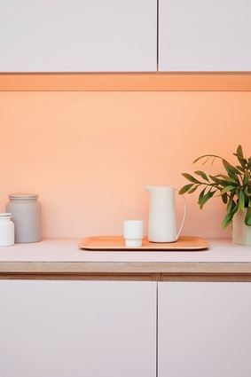 Peach and pink tones add to the warmth of the space.