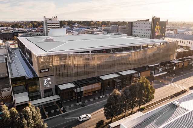 The top-level car parking is enclosed by a roof to protect it from all weather; this birds-eye view looks north.