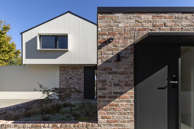 This home represents a contemporary spin on the classic New Zealand brick and weatherboard home.
