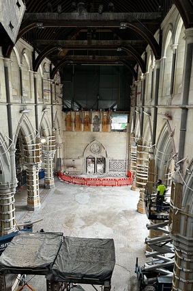 The nave following clearance of debris by the remote excavator. Strapping of the nave columns underway.