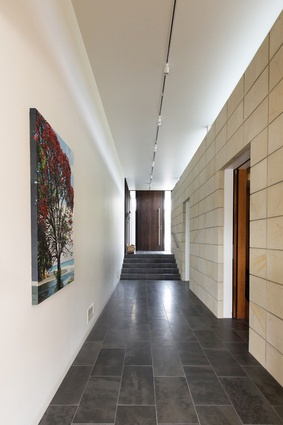 Arran Road Residence: The Hinuera stone blockwork features heavily throughout the home, both indoors and outdoors.