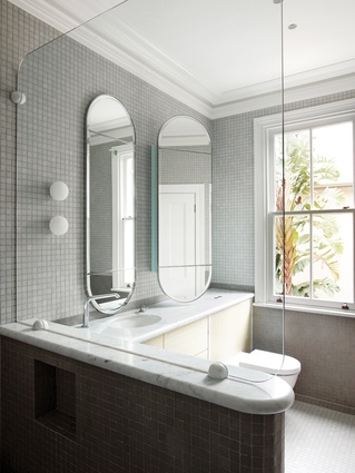 A subdued colour palette and plenty of natural light make the Private Residence bathroom a perfectly relaxing retreat.