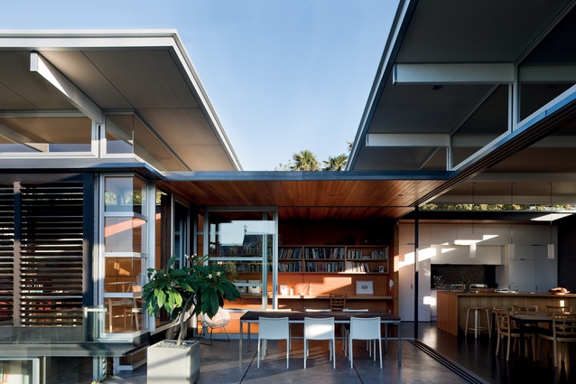 Situated around a central terrace, the enclosed areas of the house are connected by a series of flat-roofed circulation spaces.