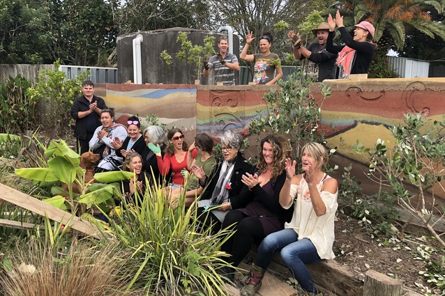 The team of artists from Te Hononga Kawaka Hundertwasser Park project and the Living House team unveiling the exciting boundary wall.