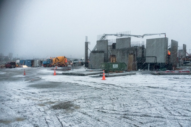 Not even the wintery weather could halt progress as the precast panels are lifted into place.