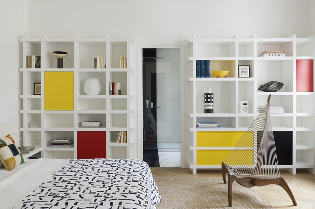 The custom-made bedroom storage unit was inspired by Mondrian’s New York City series. 
