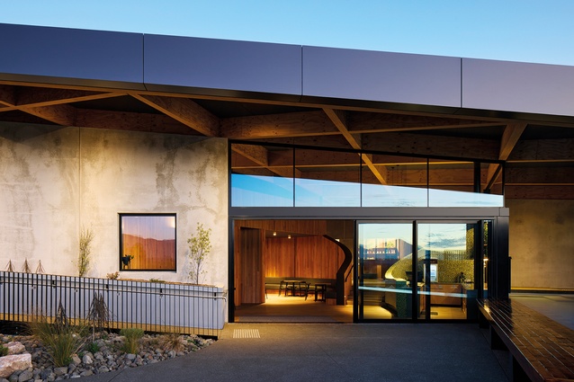 A simple palette of glazing and Thermomass concrete panels form the exterior walls.