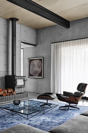 Flack’s furniture selection includes the classic Eames lounge chair and ottoman. 