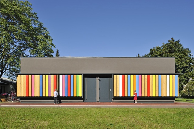 Kindergarten Kekec by Arhitektura Jure Kotnik, Slovenia. Toy slats allow for a play and educational element, where children can turn the wooden planks to show different colours.