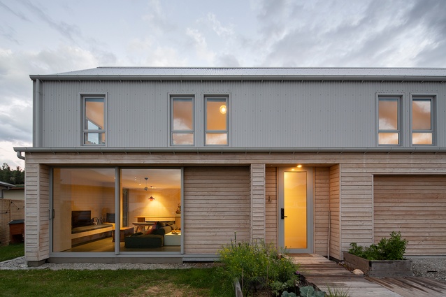 Soft textures and colours as well as low maintenance properties drove the choice of materials for this family home.
