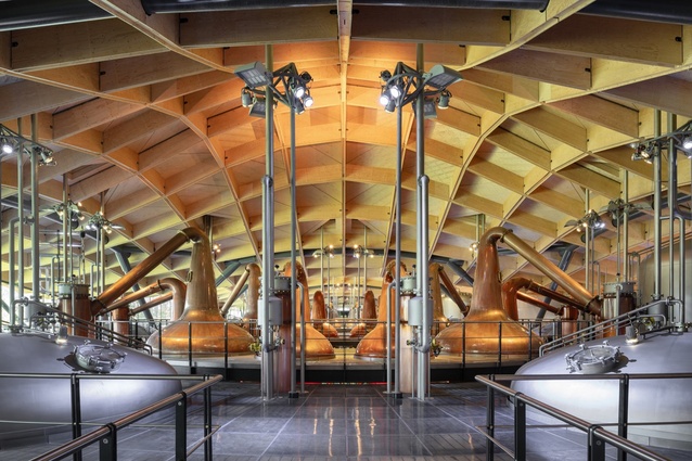 The Macallan distillery in Scotland. Inside, natural stone and timber are used to create an atmosphere for the visitor that embodies the spirit of the surrounding countryside and the story of the highly sought after whisky.