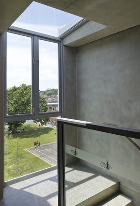 The staircase offers views out over a school and the surrounding residential neighbourhood. 