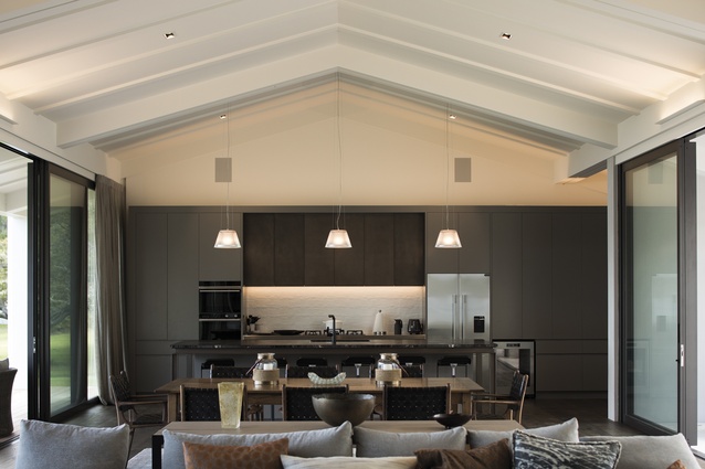 The gabled roof symmetrically frames the kitchen.