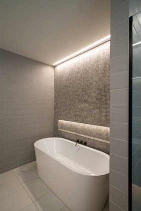 In the bathrooms, lighting is used to create a sense of luxury.