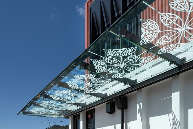 Shadows from Tracey Morgan’s glass canopy artworks visually activate the laneway corner and car park.