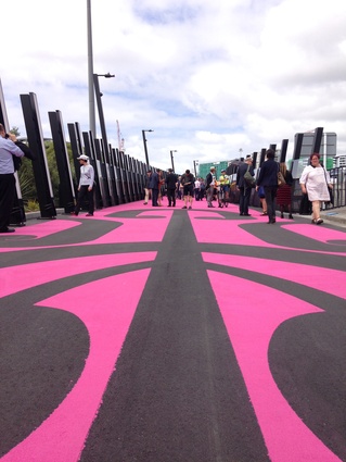 A koru design at the Nelson Street end of the path contrasts with the bright pink.