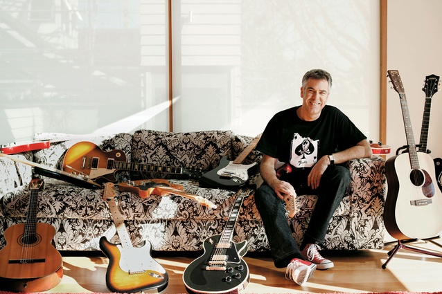 Mark Gascoigne with guitar collection.
