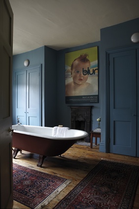Walls painted in Farrow and Ball’s Stone Blue.