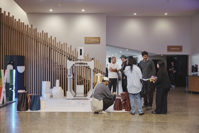 Conference attendees check out the Special Studio 3D printing exhibit.