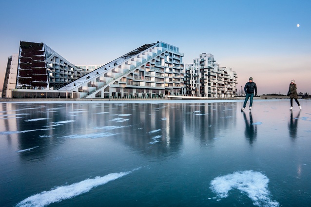 8 House in Ørestad, Copenhagen, Denmark, by Bjarke Ingels Group (BIG), is arranged by stacking retail, rowhouses and apartments into an urban neighbourhood, connected by a promenade and a cycle track which reach up to the 10th floor.