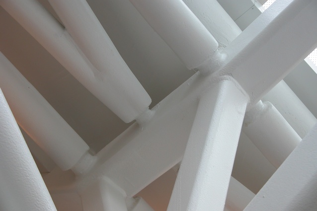 This truss structure uses a fairly thick intumescent coating for its fire protection. This has changed the way the connections have been detailed; they didn’t need excessive grinding.