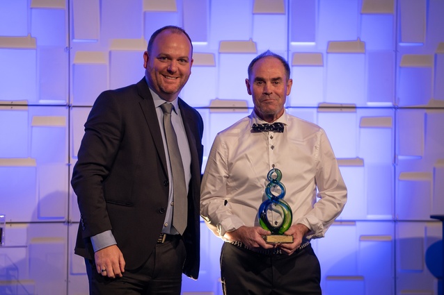 Sponsor ABB's Duncan Baker Vice President of Marketing and Sales, with Buzz Berham of Buzz Electrics, winner of the Project Award for a project between 1-5 million.