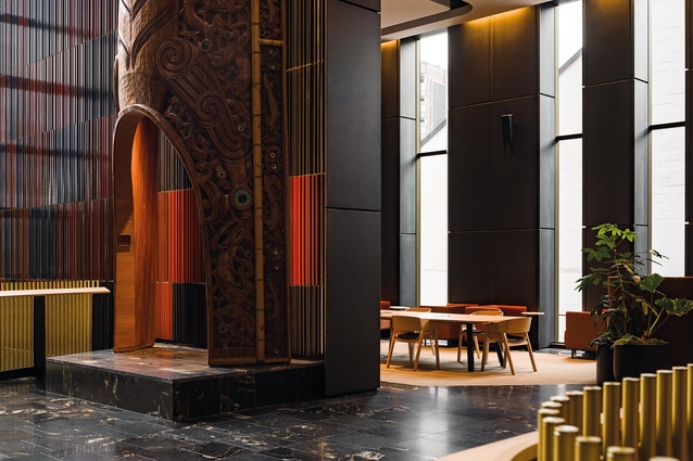 ‘Public’ space in the foyer, with, at left, Lyonel Grant’s artwork, <em>Pou Wairua Waka</em>.