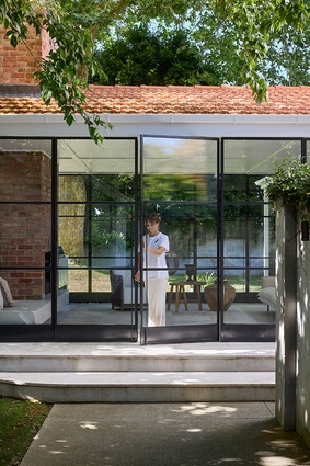 The Garden Room by Edwards White Architects, a glasshouse addition to a 1920s-era heritage home.