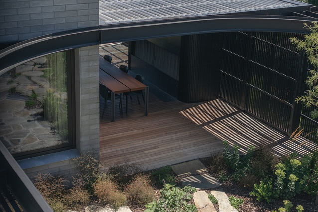 The lanai and planted courtyard, viewed from the main bedroom in the ‘static’ zone of the ‘retreat’ wing.